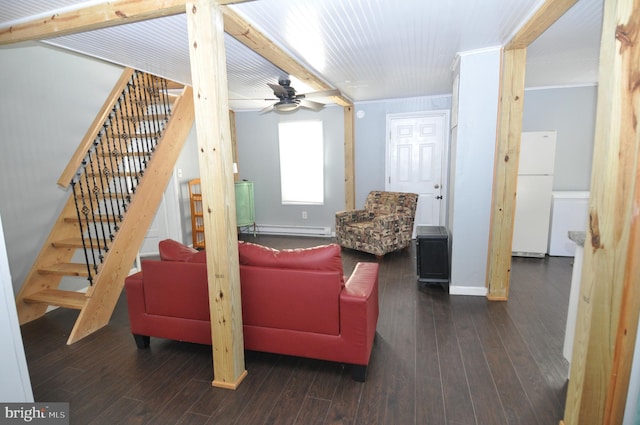 living room with ceiling fan, dark hardwood / wood-style flooring, ornamental molding, and a baseboard heating unit