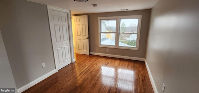 unfurnished room featuring light wood-type flooring