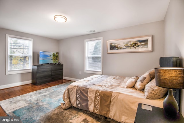 bedroom with wood-type flooring