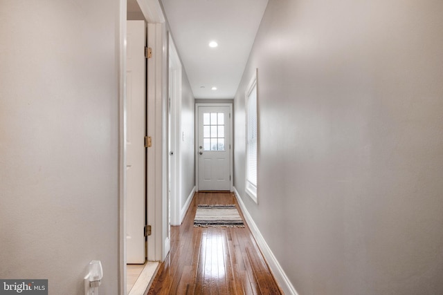 hallway featuring light wood-type flooring