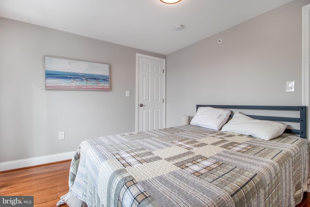 bedroom featuring hardwood / wood-style floors