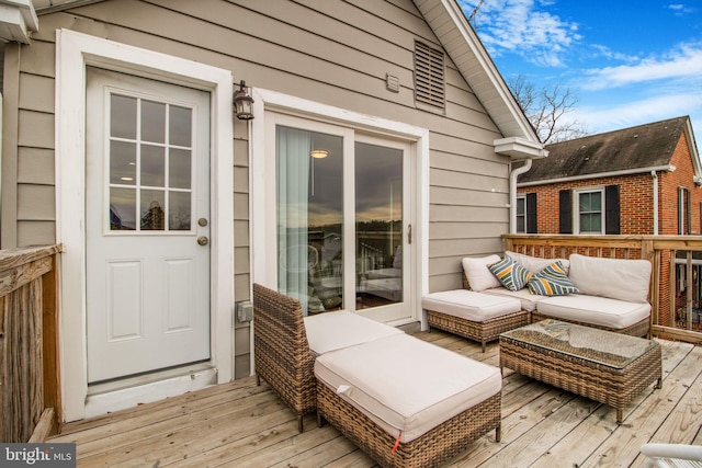 deck featuring an outdoor living space