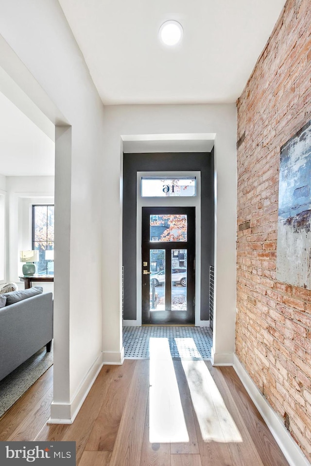 foyer entrance featuring light wood-type flooring