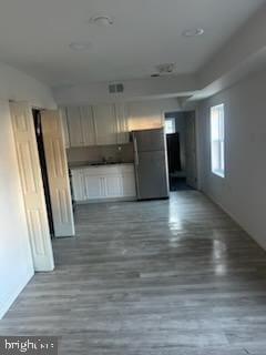 interior space with dark wood-type flooring