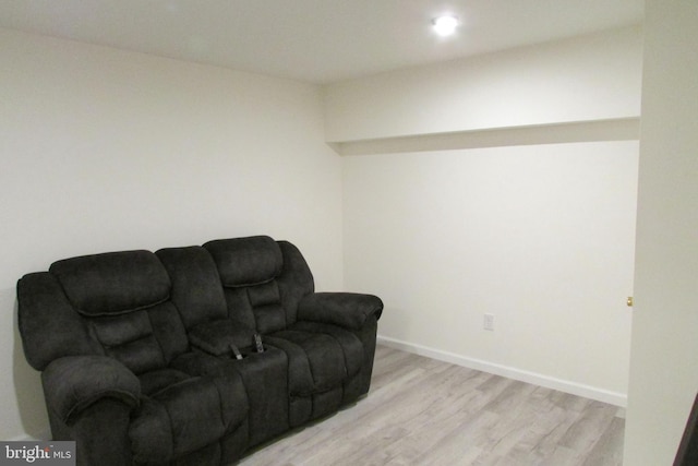 sitting room with light wood-type flooring