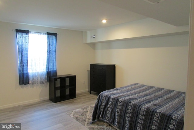 bedroom featuring light hardwood / wood-style flooring