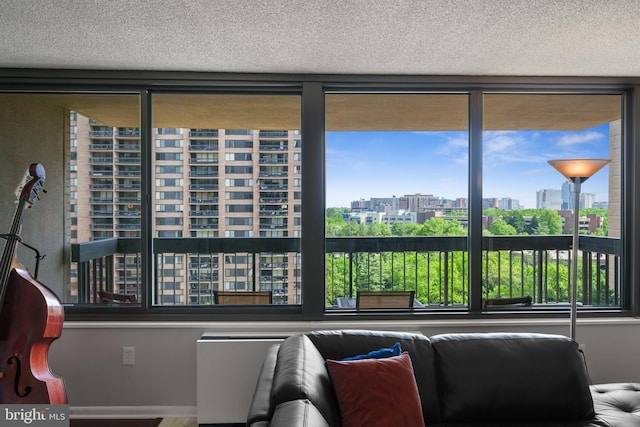 3701 S George Mason Dr Unit 1005N, Falls Church, VA 22041 - interior space featuring a textured ceiling and a city view