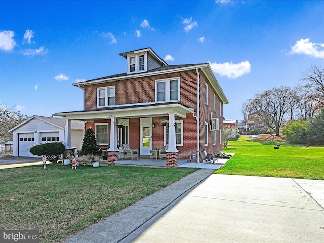 view of front of house with a porch, a garage, and a front yard