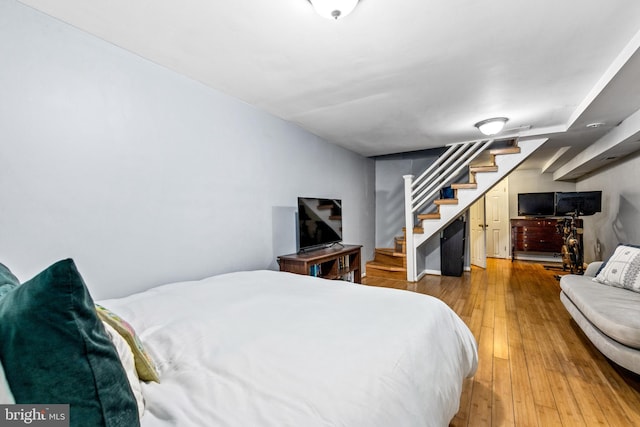 bedroom featuring hardwood / wood-style flooring