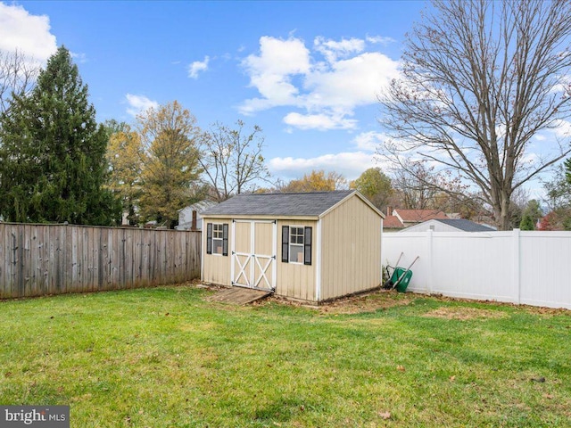 view of outdoor structure featuring a yard