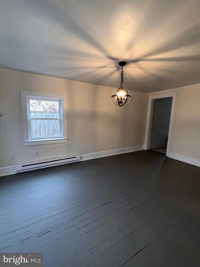 unfurnished room with a chandelier, a baseboard radiator, and dark hardwood / wood-style floors