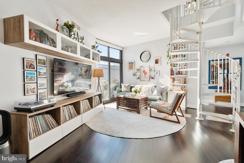 living area featuring dark hardwood / wood-style floors