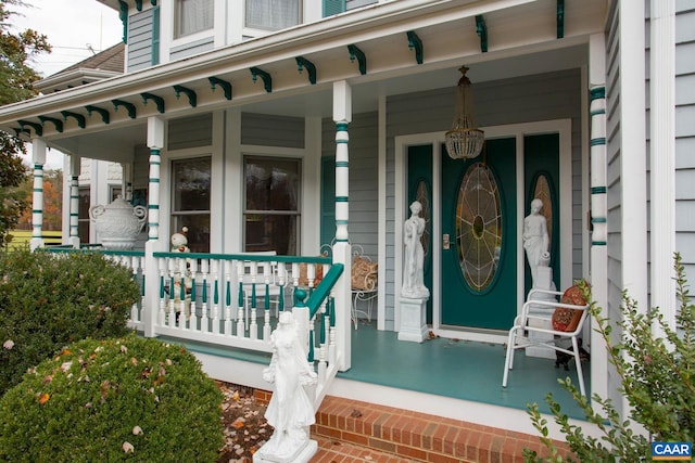 property entrance with covered porch