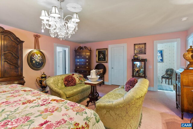 bedroom with light carpet and a chandelier