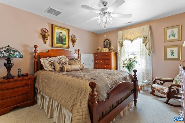 bedroom featuring ceiling fan and light colored carpet