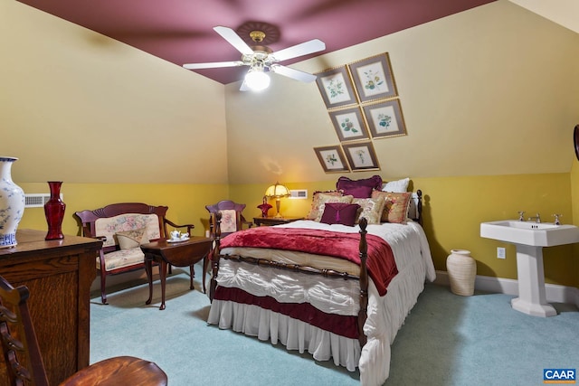 bedroom featuring light colored carpet, ceiling fan, and lofted ceiling