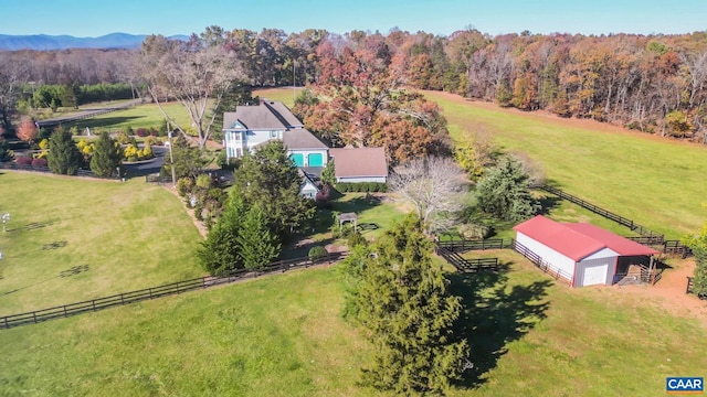 birds eye view of property featuring a rural view