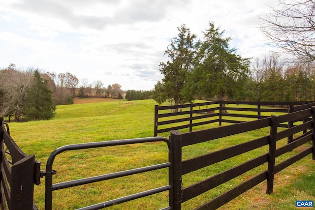 view of gate featuring a rural view