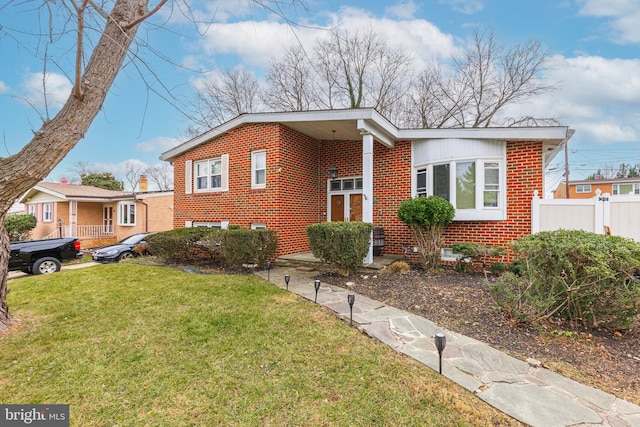 view of front of property with a front lawn