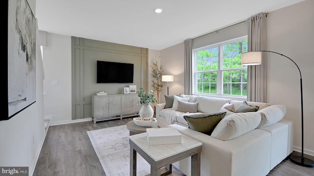 living room with hardwood / wood-style floors