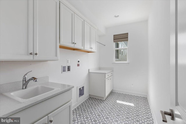 laundry area with electric dryer hookup, sink, cabinets, and washer hookup