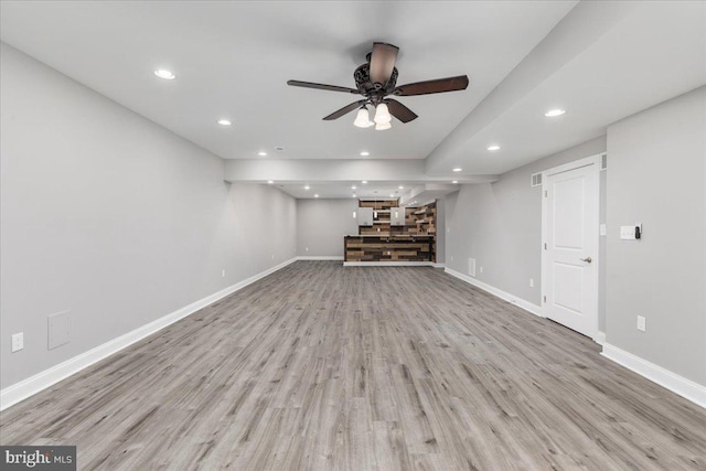 interior space featuring ceiling fan and light wood-type flooring