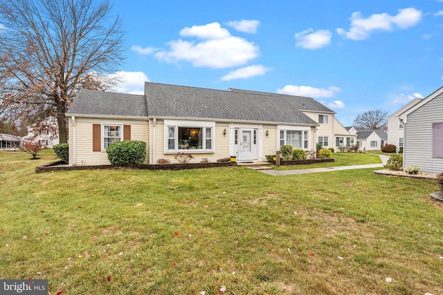 view of front of property with a front yard