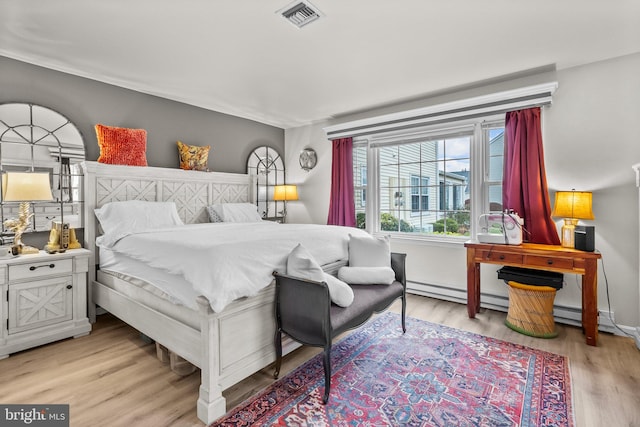 bedroom featuring light wood-type flooring