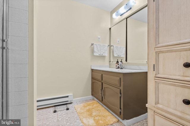 bathroom featuring vanity and a baseboard heating unit