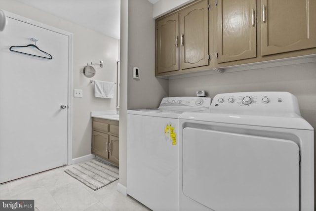 washroom featuring washer and dryer