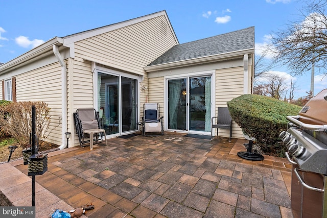 rear view of property with a patio area