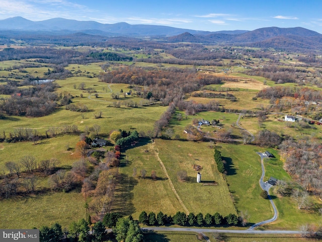 bird's eye view featuring a mountain view and a rural view