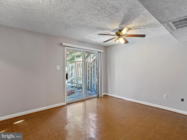 empty room featuring ceiling fan