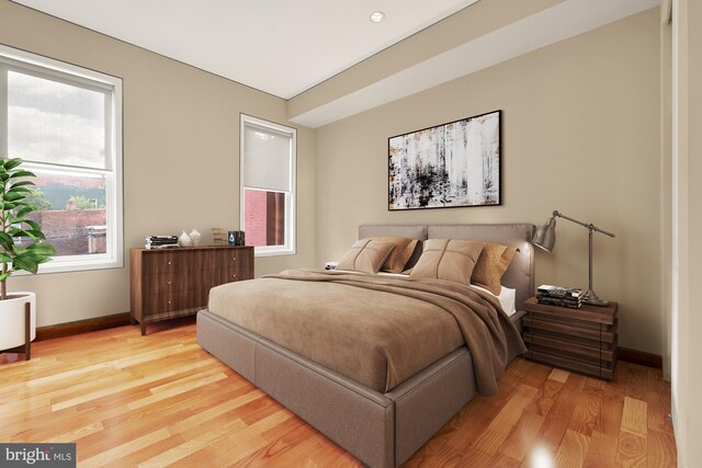 bedroom with light wood-type flooring