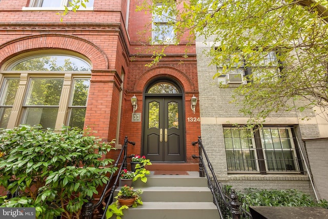 doorway to property featuring french doors