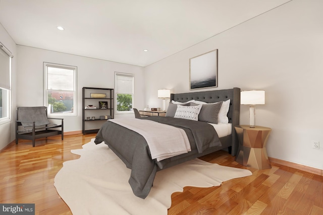 bedroom with light hardwood / wood-style flooring