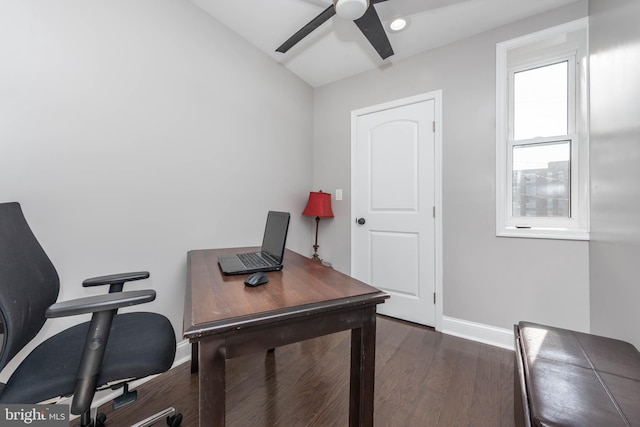 office space featuring ceiling fan, dark wood-type flooring, and vaulted ceiling