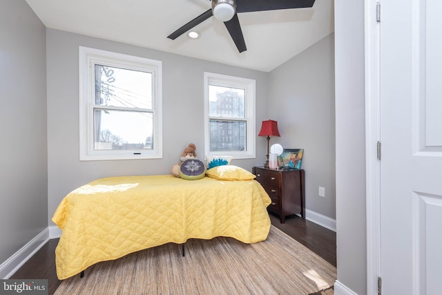 bedroom with ceiling fan and hardwood / wood-style floors