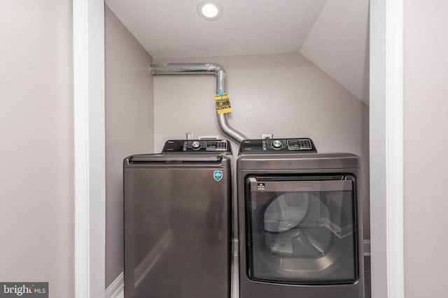 laundry area with washing machine and dryer