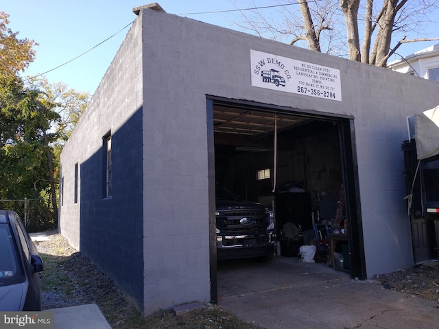 view of outbuilding with a garage