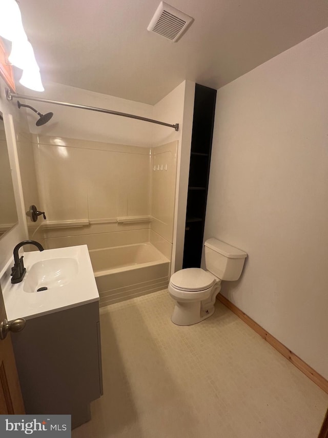 full bathroom featuring bathtub / shower combination, vanity, and toilet