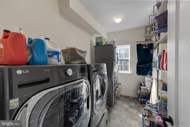 washroom featuring washer and clothes dryer