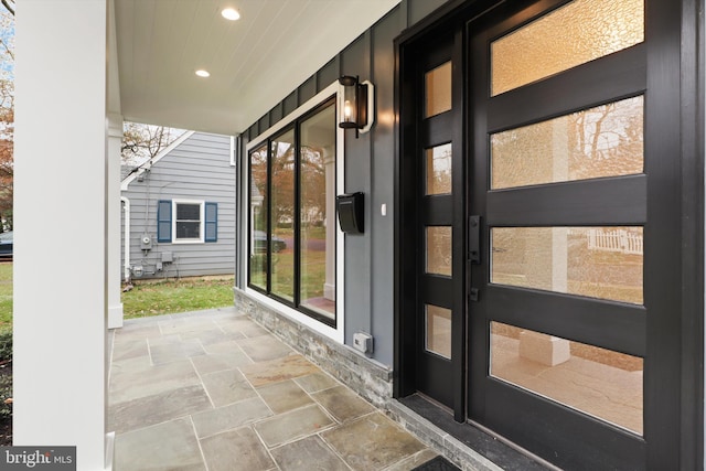 entrance to property with covered porch