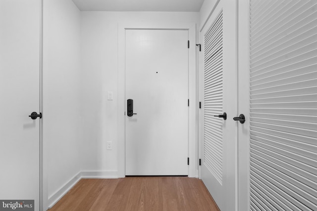 hallway featuring light wood-type flooring