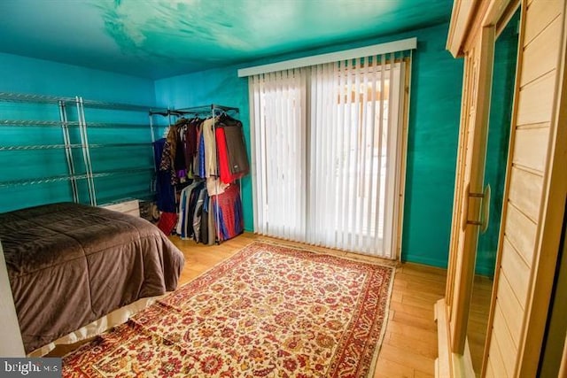 bedroom with light hardwood / wood-style flooring