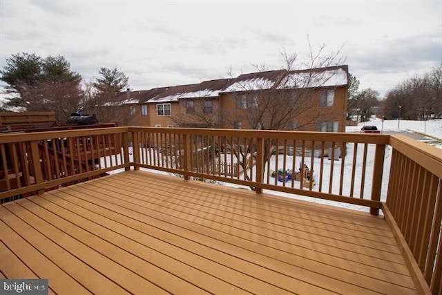 view of snow covered deck