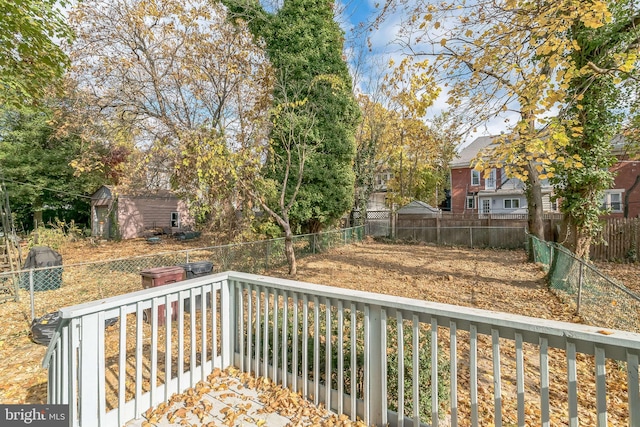 deck with a storage shed