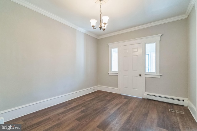 foyer entrance with a chandelier, ornamental molding, a baseboard radiator, and dark wood-type flooring