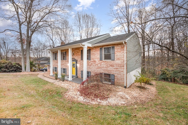 view of front of house with a front lawn