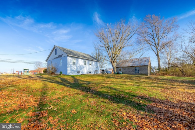 exterior space with a yard